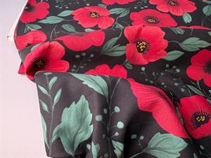 Vævet bomuldspoplin - smukke valmuer på sort bund