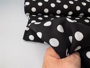 Fastvævet viscose - små polkaprikker sort / hvid