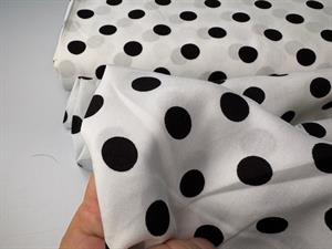 Fastvævet viscose - små polkaprikker hvid / sort