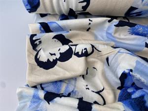 Viscosejersey - yndige blomster i blide toner