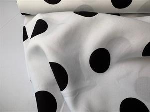 Fastvævet viscose - store polkaprikker hvid / sort