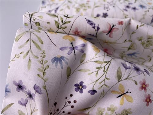 Vævet bomuldspoplin - små pastelfarvede blomster på hvid bund