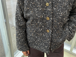 Frakkeuld - sildebensvævet i gråsort med tweed look